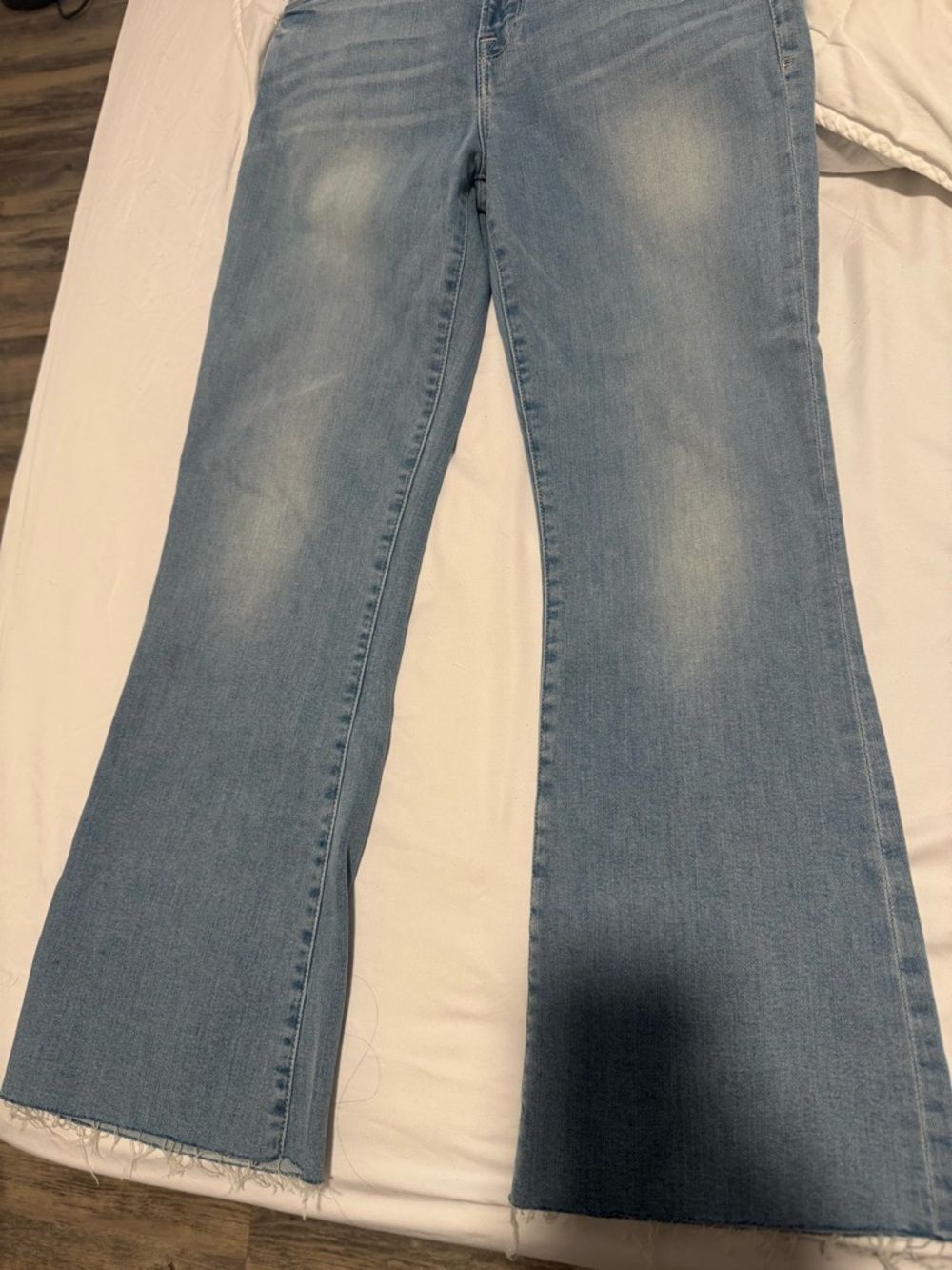 Frame Denim Light Wash Flare Jeans with Raw Hem